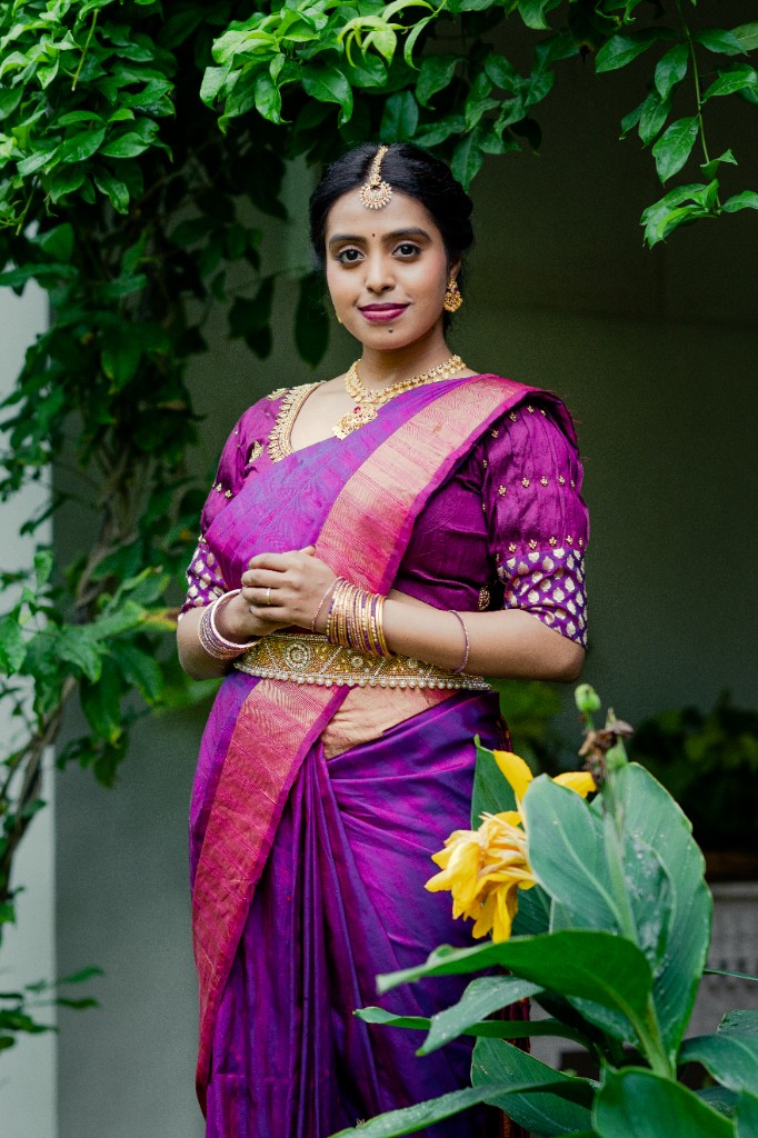 Swetha in purple saree